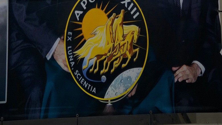 A portrait of the Apollo 13 astronauts on display at the NASA Space Center